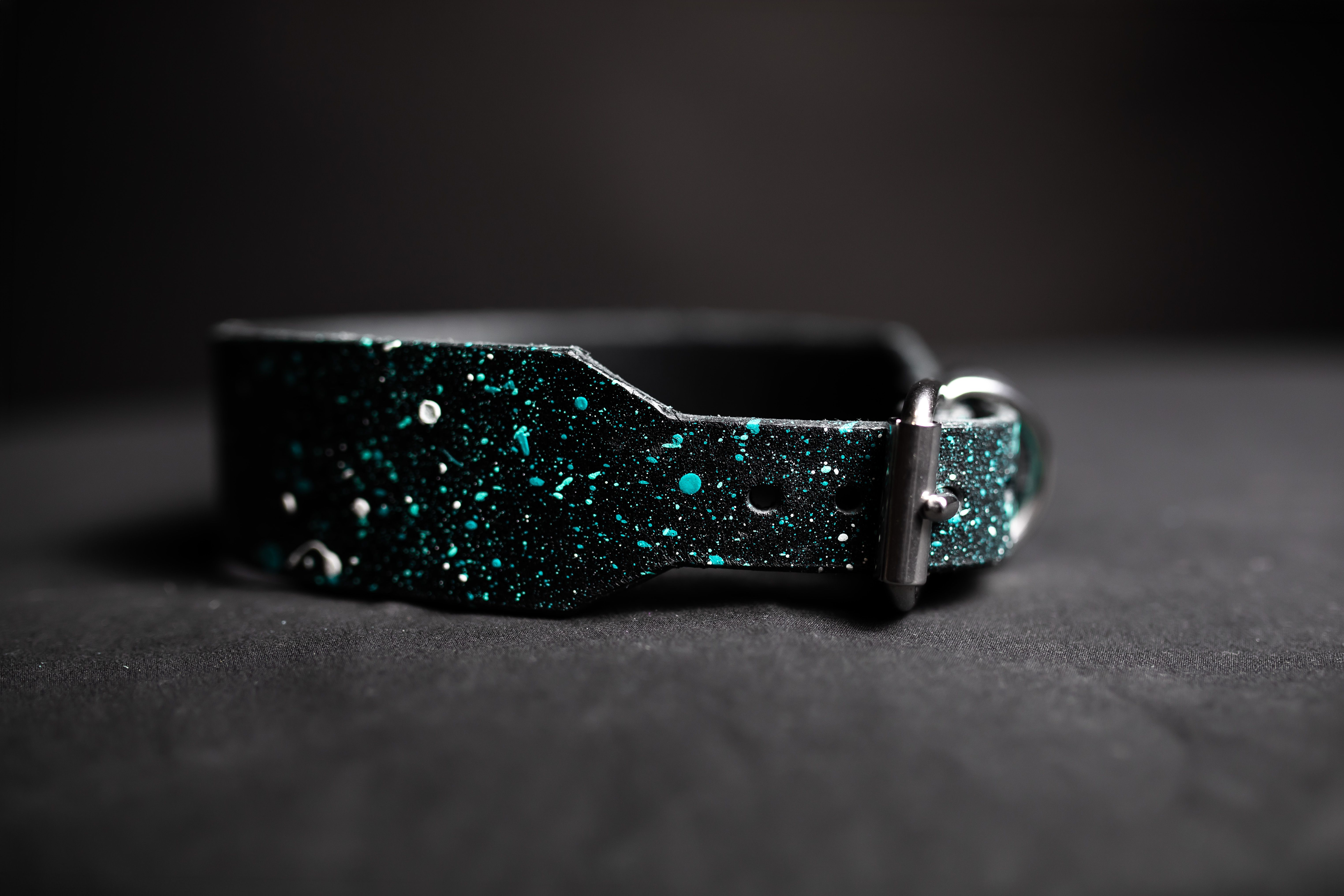Close-up of a black collar with turquoise material details